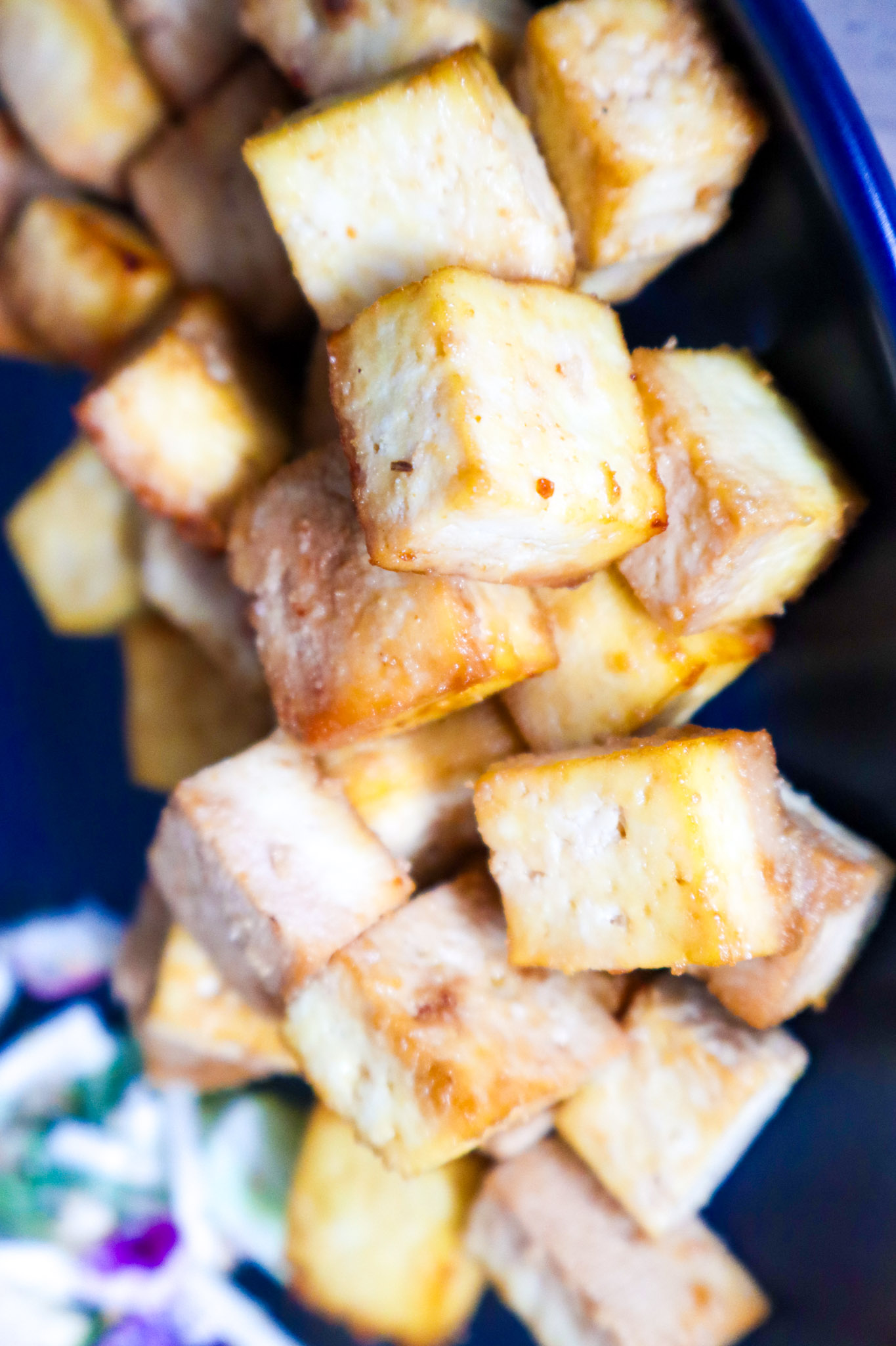 A plate with baked tofu arranged neatly